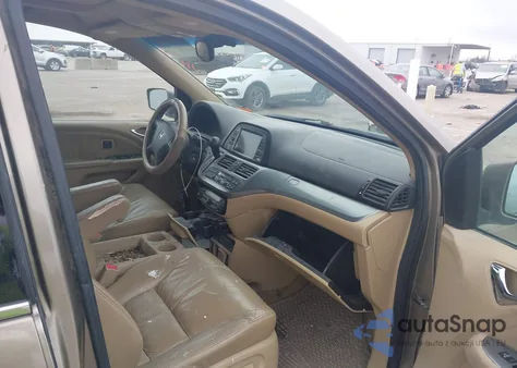 2010 Honda Odyssey Touring z USA, uszkodzony, nr VIN 5FNRL3H90AB047535